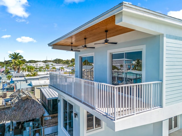 exterior space with ceiling fan