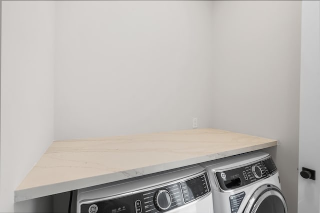 laundry area featuring independent washer and dryer