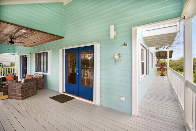 25057 7th St, Summerland, FL 33042 - deck with french doors and a ceiling fan