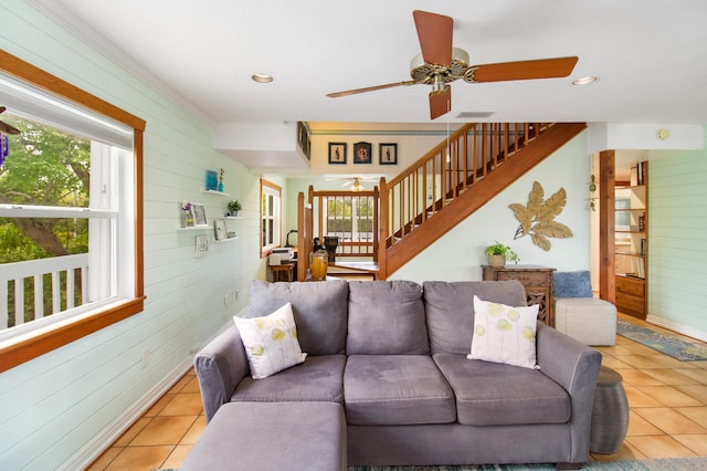 25057 7th St, Summerland, FL 33042 - tiled living area featuring healthy amount of natural light, a ceiling fan, stairs, wooden walls, and recessed lighting