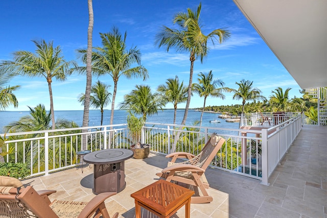 view of patio / terrace with a water view