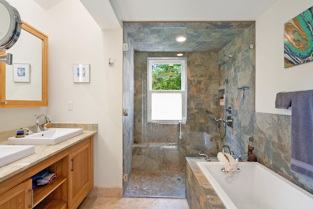 full bathroom featuring a relaxing tiled tub, a sink, a tile shower, and double vanity