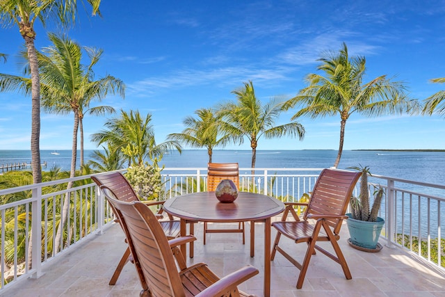 balcony featuring a water view