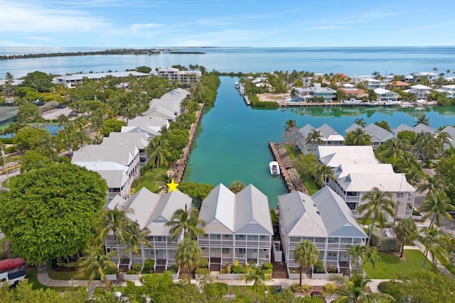 drone / aerial view with a water view