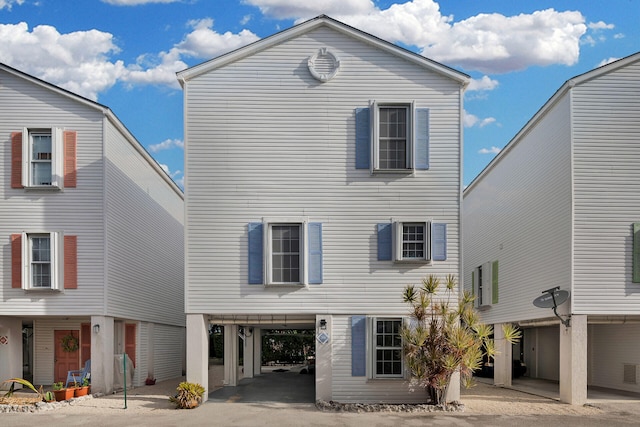 view of front of home with a carport