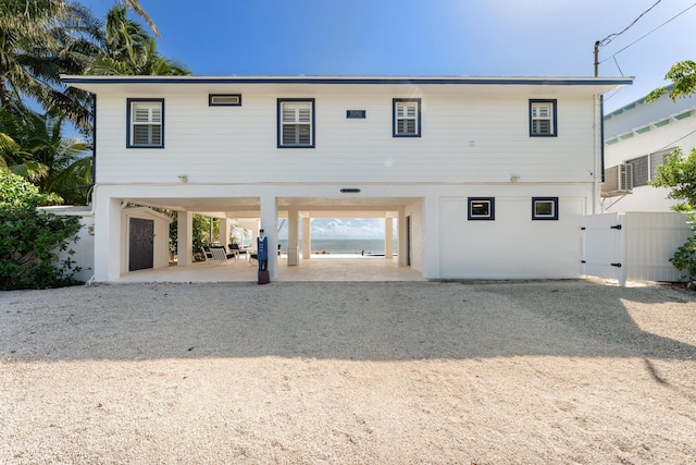 view of front of property with a carport