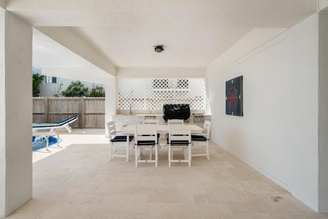 view of patio with a grill