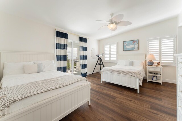 bedroom with ceiling fan and dark hardwood / wood-style flooring