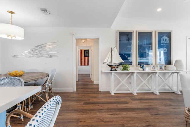 dining room featuring dark hardwood / wood-style flooring