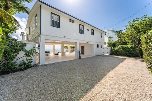 rear view of house featuring a patio area