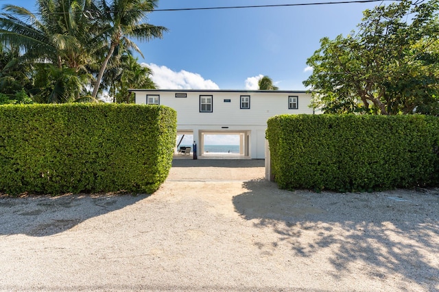 view of front facade with a carport