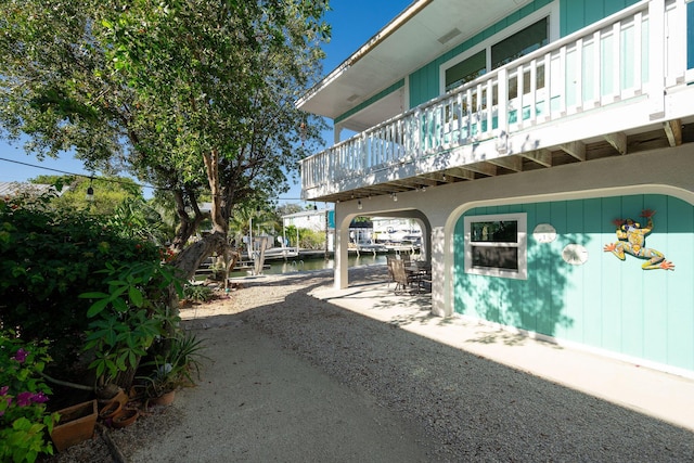 22738 Blackbeard Ln, Cudjoe, FL 33042 - view of patio / terrace featuring a balcony and a water view
