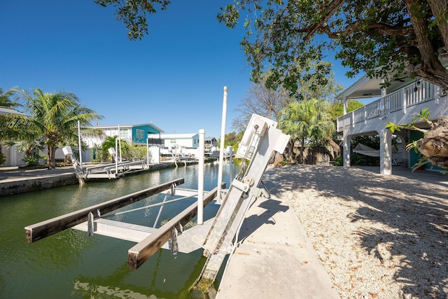 22738 Blackbeard Ln, Cudjoe, FL 33042 - dock with boat lift and a water view