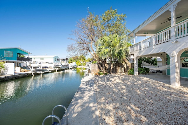 22738 Blackbeard Ln, Cudjoe, FL 33042 - dock area with a water view and a balcony