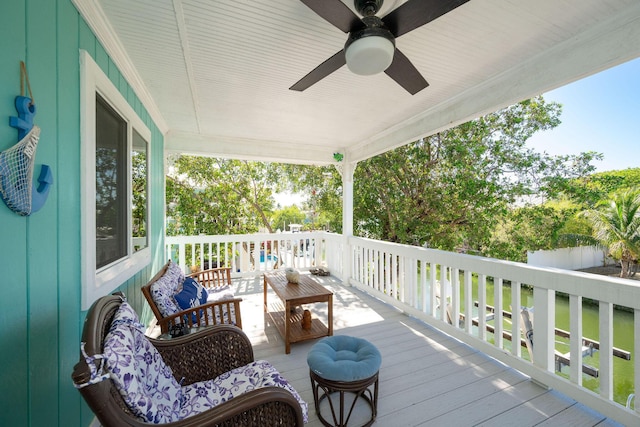 22738 Blackbeard Ln, Cudjoe, FL 33042 - wooden deck with a ceiling fan