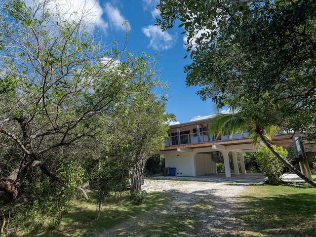 view of front of home with a carport