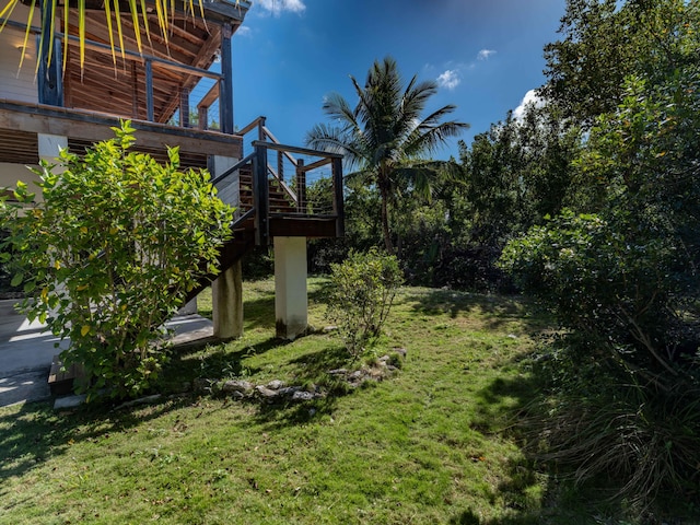 view of yard with a wooden deck