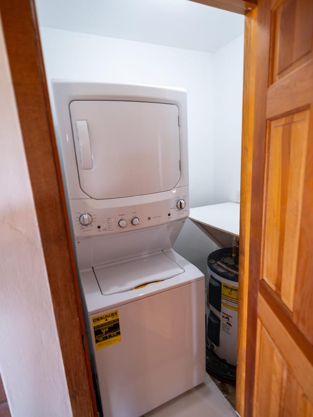 laundry room featuring stacked washer and dryer