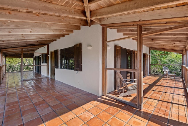 view of patio with an outbuilding