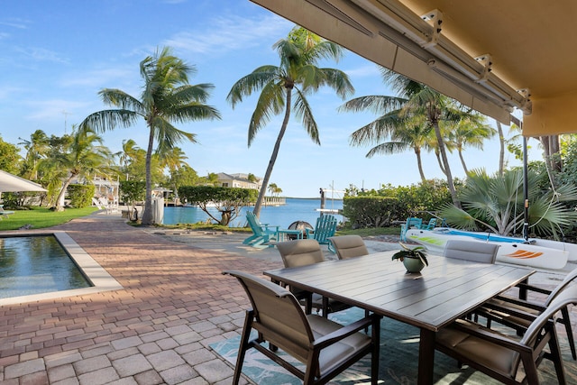 view of patio featuring a water view