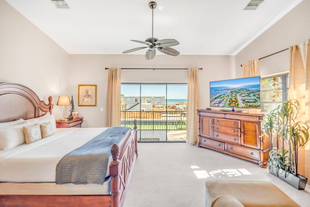 carpeted bedroom featuring ceiling fan and access to exterior