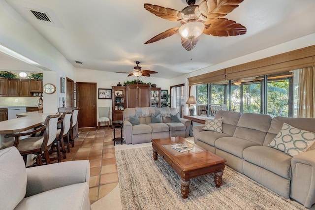 living room with visible vents and light tile patterned floors