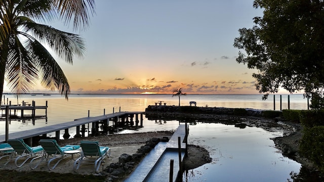 view of dock with a water view