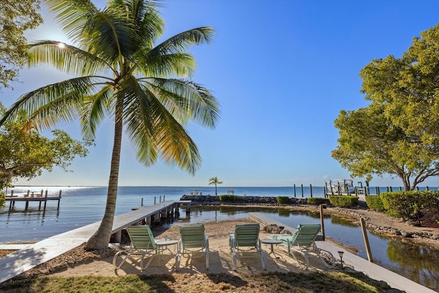 view of dock with a water view