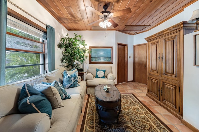 living area featuring a ceiling fan, wooden ceiling, and light tile patterned flooring