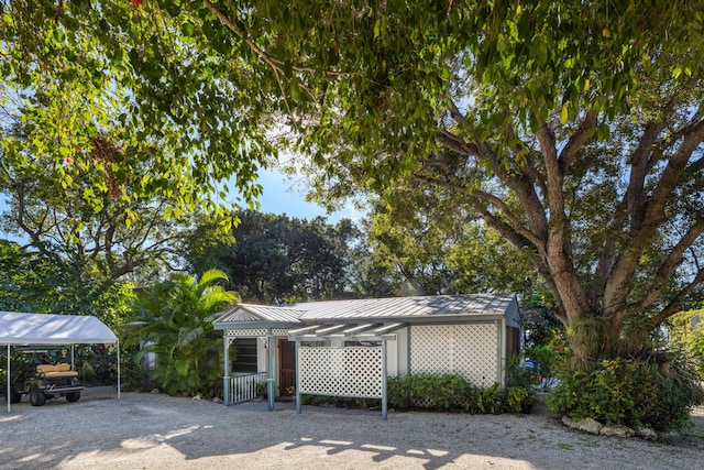 view of home's community featuring a carport