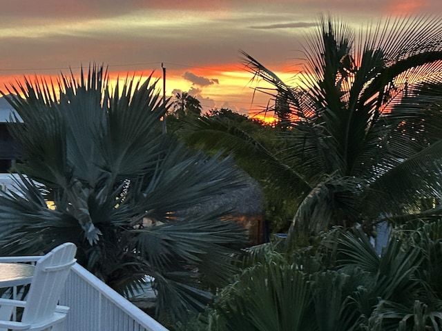 view of pool at dusk