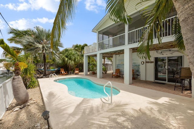 view of swimming pool with a patio area