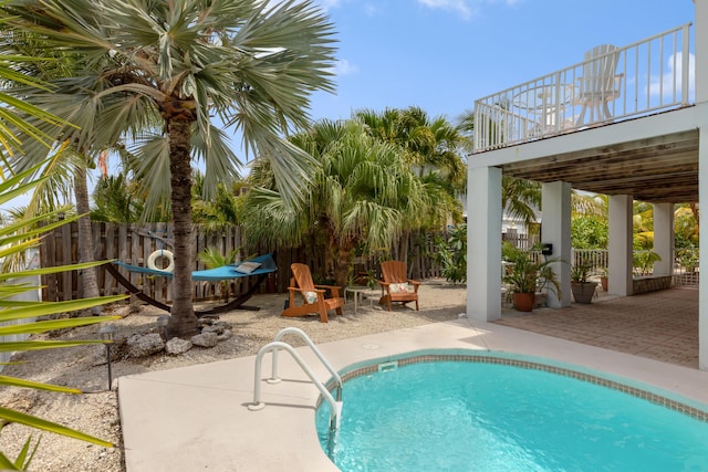 view of swimming pool featuring a patio