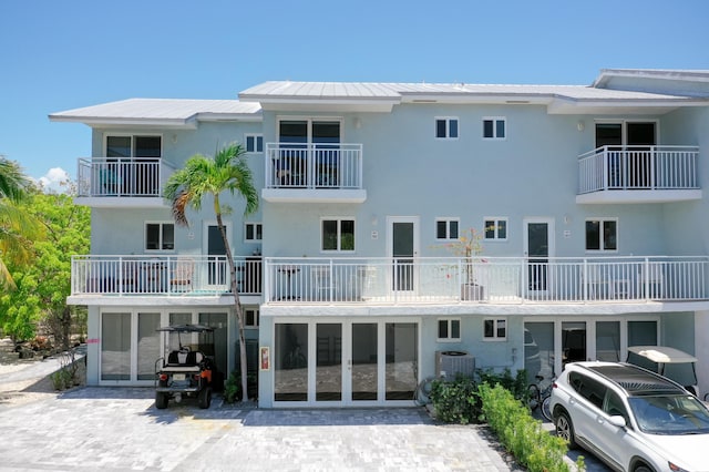 1500 Ocean Bay Dr Unit M6, Key Largo, FL 33037 - view of building exterior with decorative driveway and central air condition unit