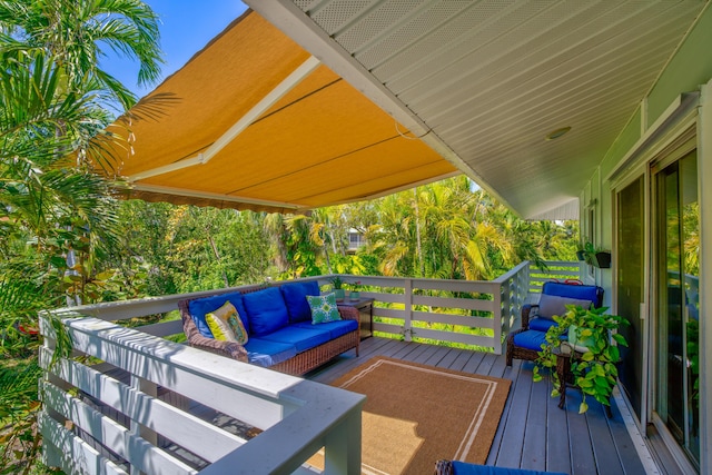 wooden deck featuring an outdoor living space