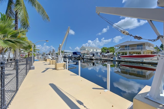 dock area with a water view