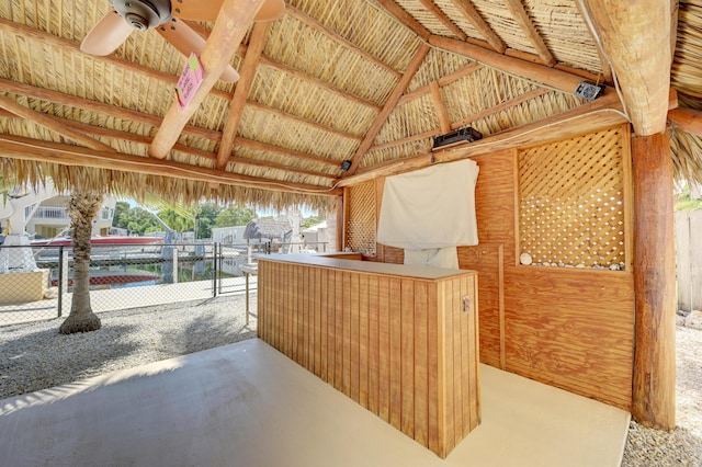 view of patio / terrace with a gazebo and a bar