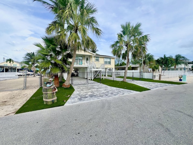 beach home with a front yard