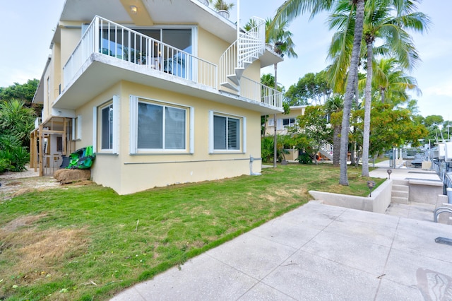 view of property exterior featuring a yard