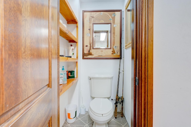 bathroom featuring toilet