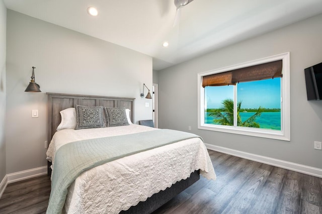 bedroom featuring baseboards, recessed lighting, and dark wood-style flooring