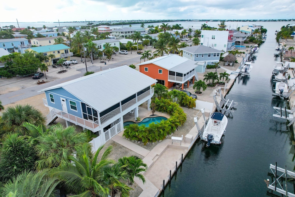 bird's eye view with a water view