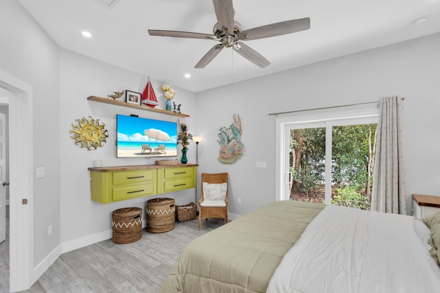 bedroom featuring ceiling fan, access to exterior, and light hardwood / wood-style flooring