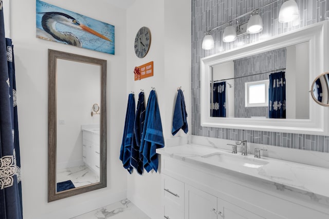 bathroom with vanity and curtained shower