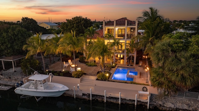 exterior space with a patio area and a balcony