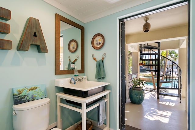 bathroom with sink and toilet