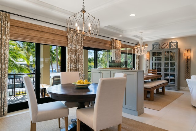 tiled dining space with ornamental molding, a wealth of natural light, and a notable chandelier