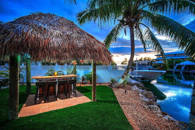 yard at dusk with a patio