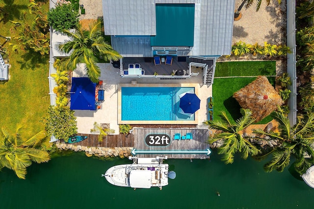 drone / aerial view featuring a water view