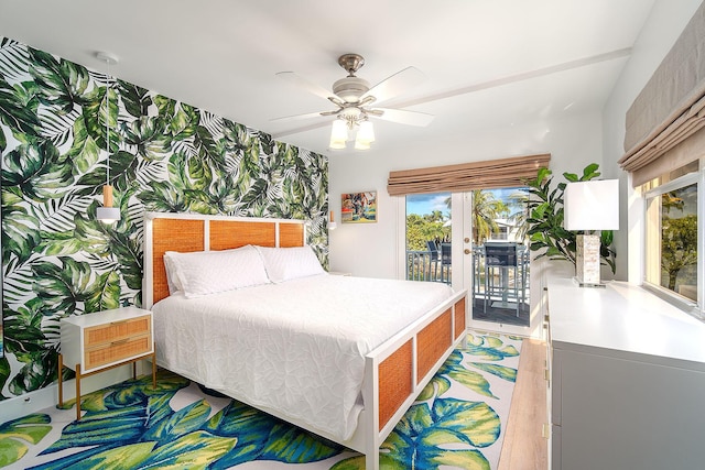 bedroom featuring french doors, access to outside, ceiling fan, and light hardwood / wood-style flooring